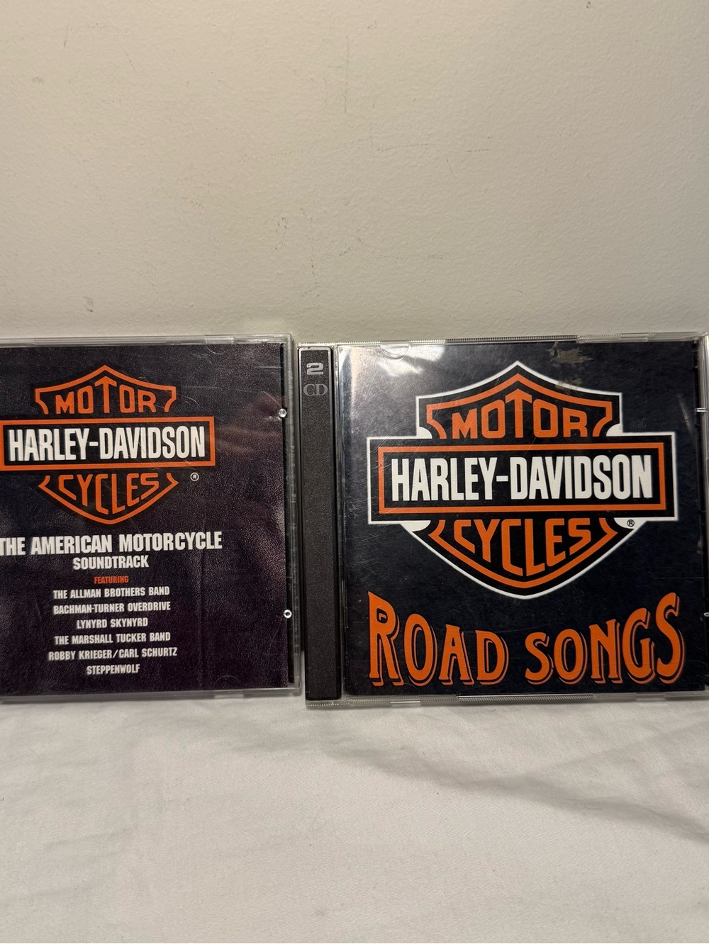 Two CD's Harley Davidson American Motorcycle Soundtrack And Road Songs.